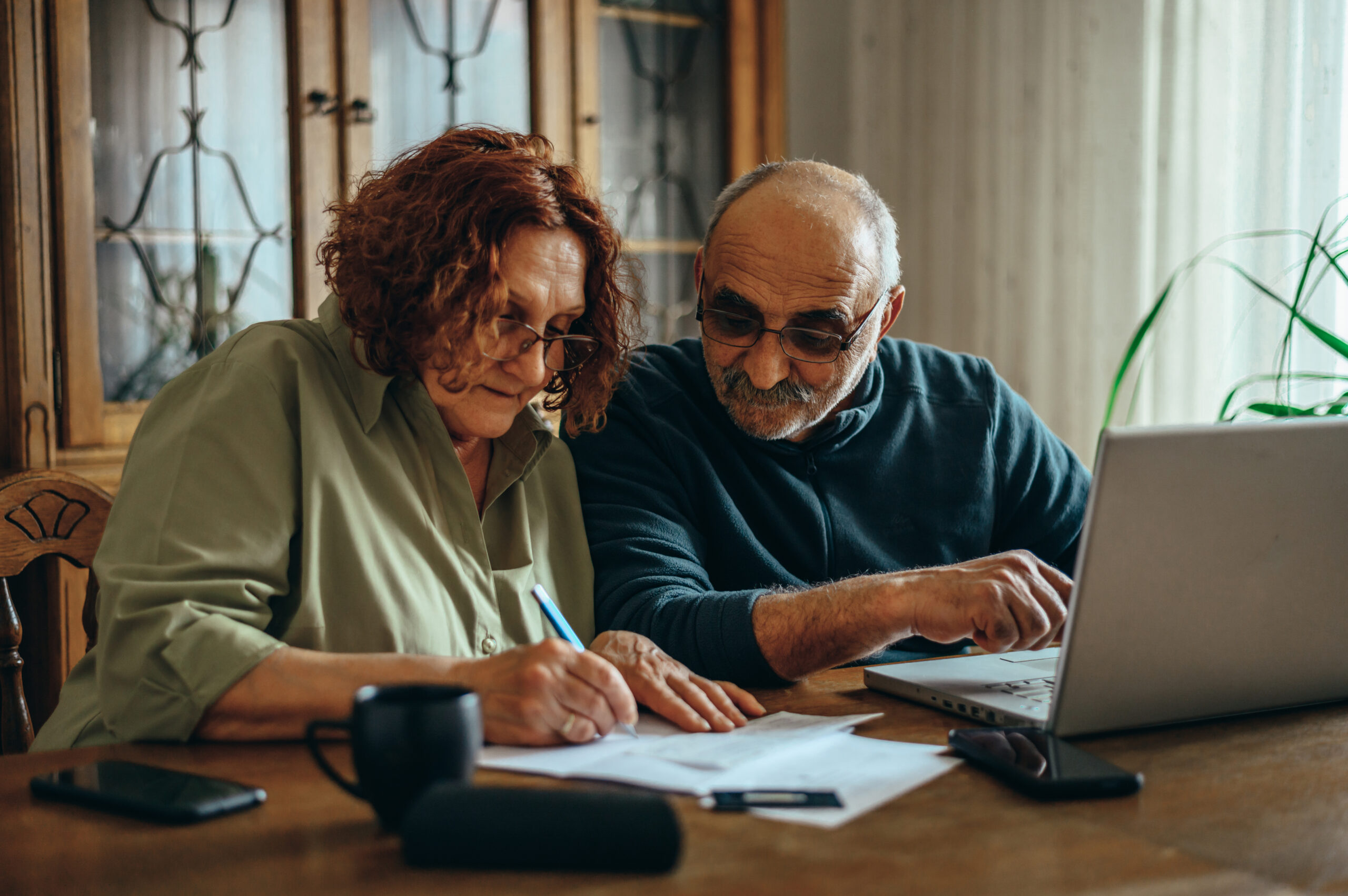 Senior couple doing paperwork