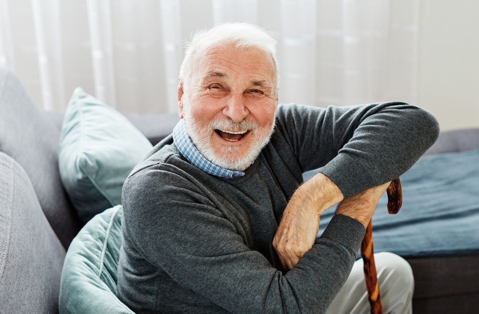 a senior smiles at the camera